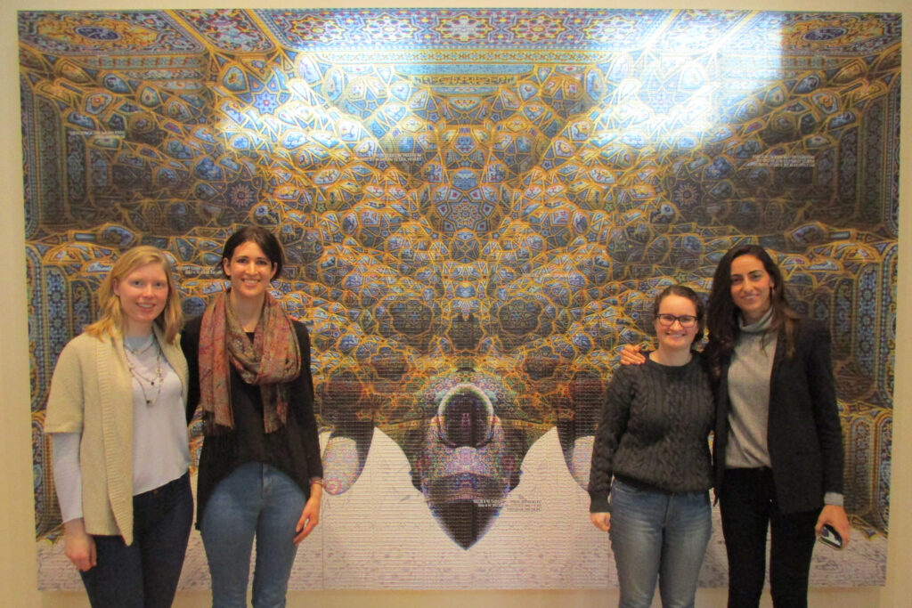 Bates students standing in front of Ricochet by Abdulnasser Gharem at the Bates College Museum of Art. Photo by Loring Danforth.